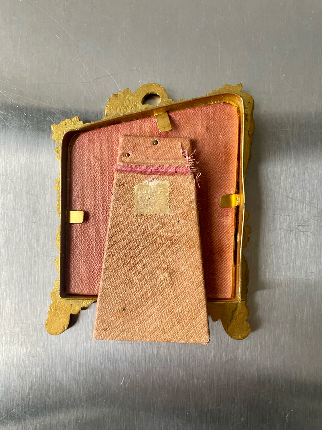 Metal gold colored picture frame brass