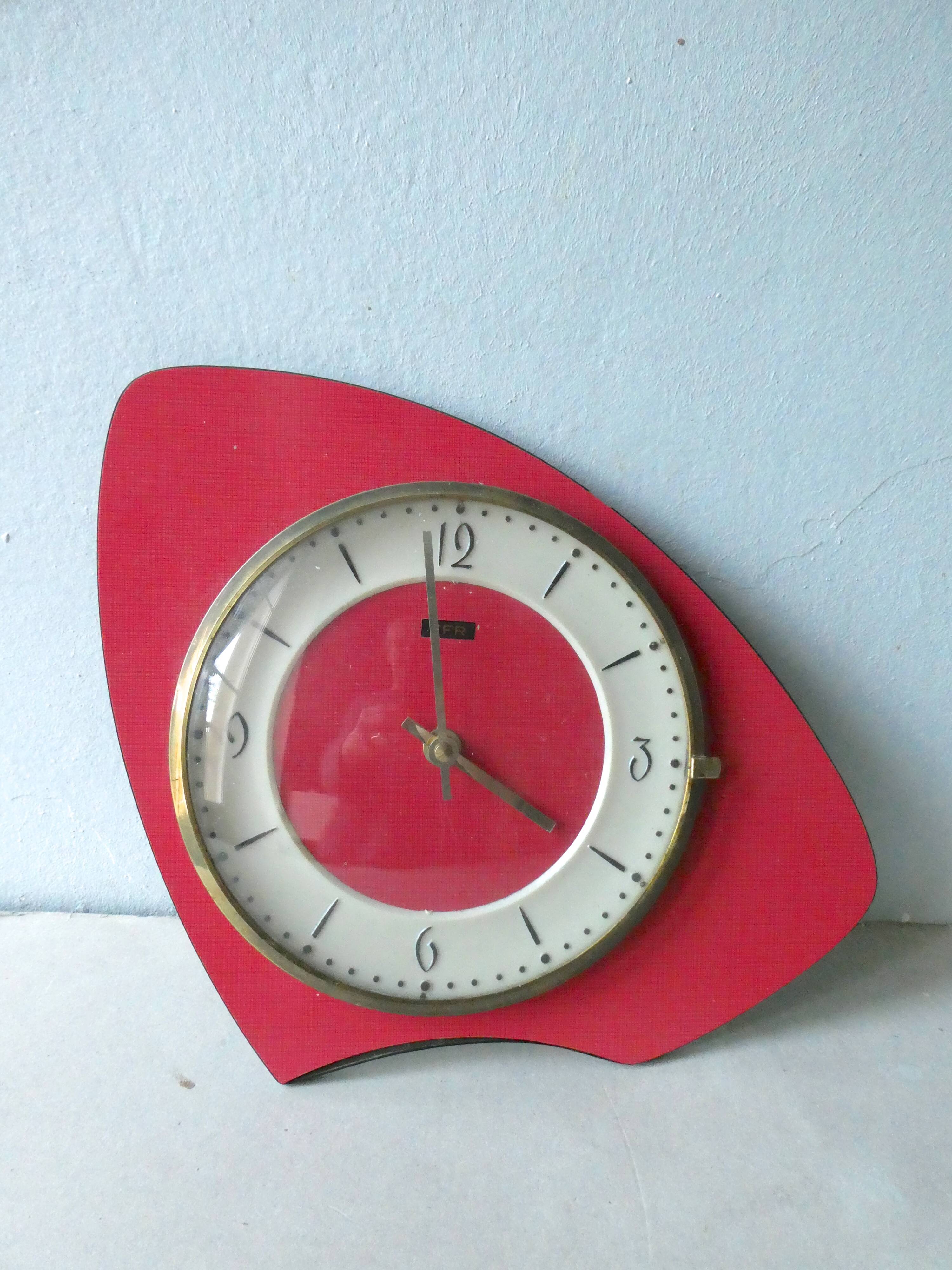 Pendulum wall clock FFR in formica red of the 1960s