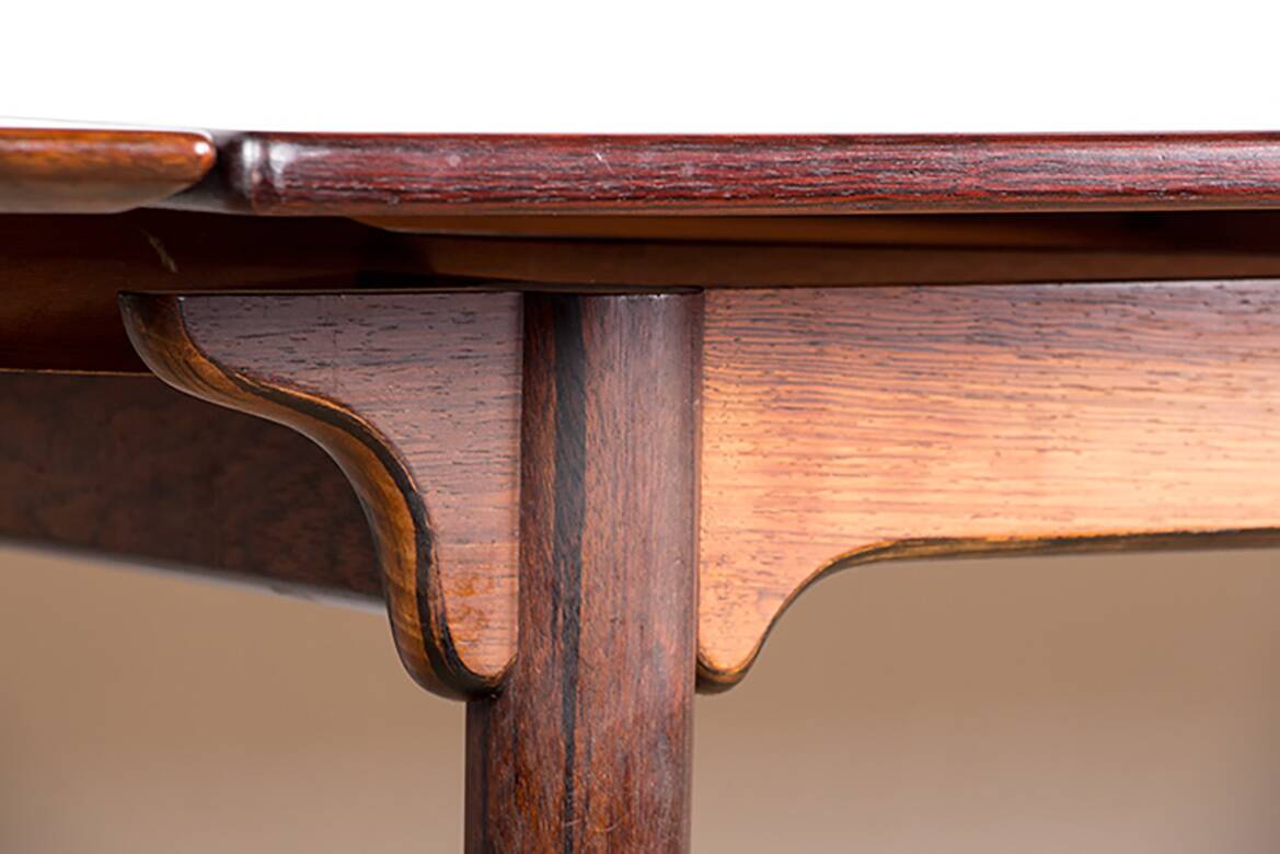 Danish extendable dining table in rosewood, model 54 by Gunni Omann