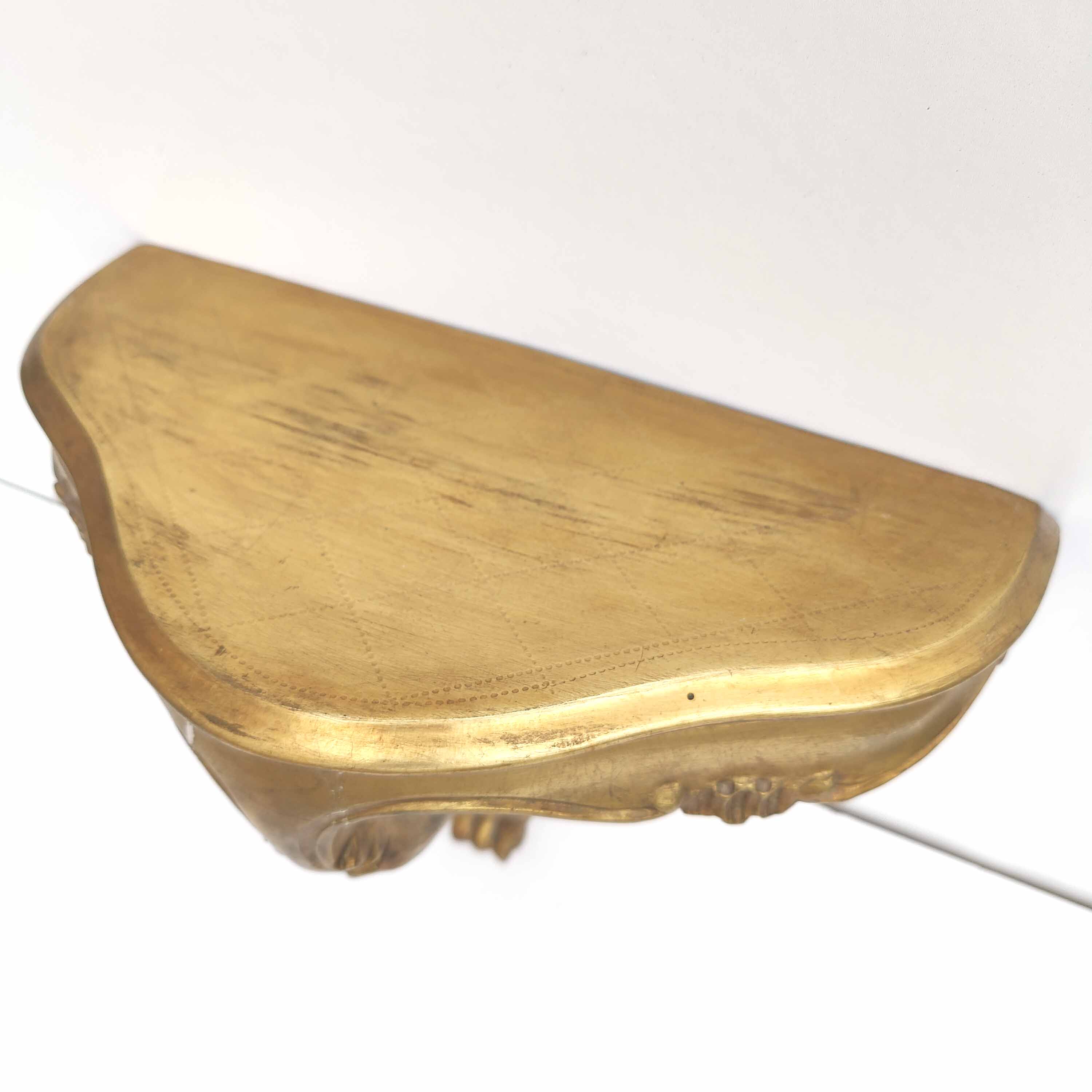 Small golden console