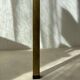 Swedish brass coffee table with a marbled glass top from the 1960s.