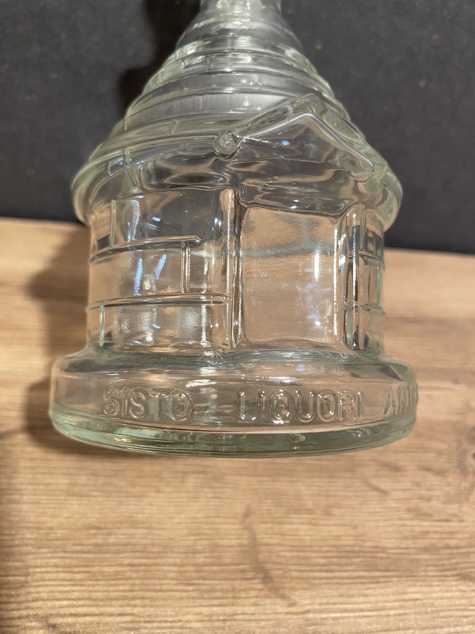 Glass bottle marked sisto liquor antica specialita del trulli
