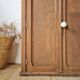 Small Parisian oak wardrobe with its porcelain knob.