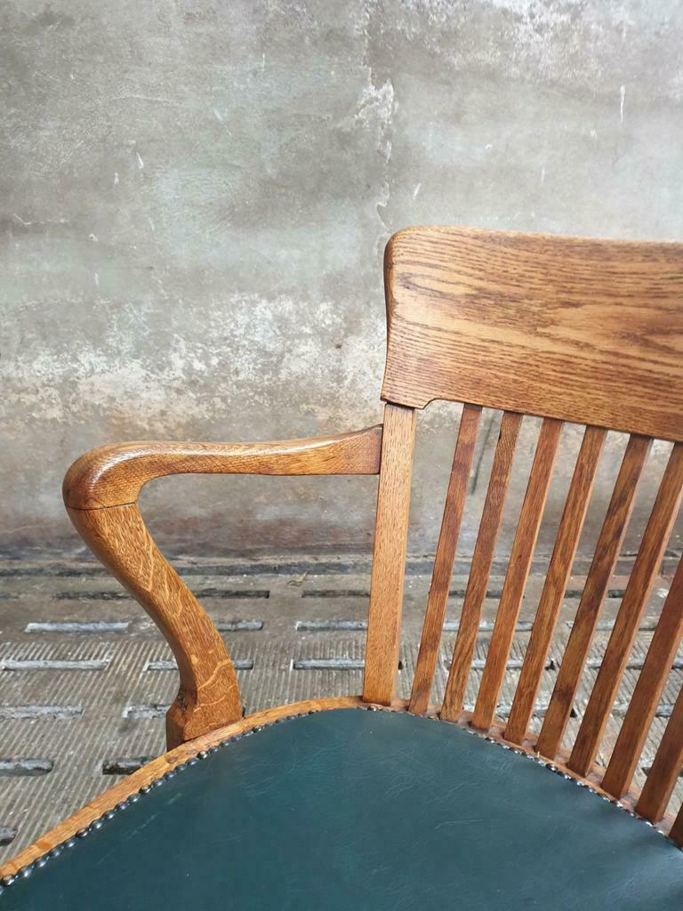 Antique office chair oak adjustable with green leather