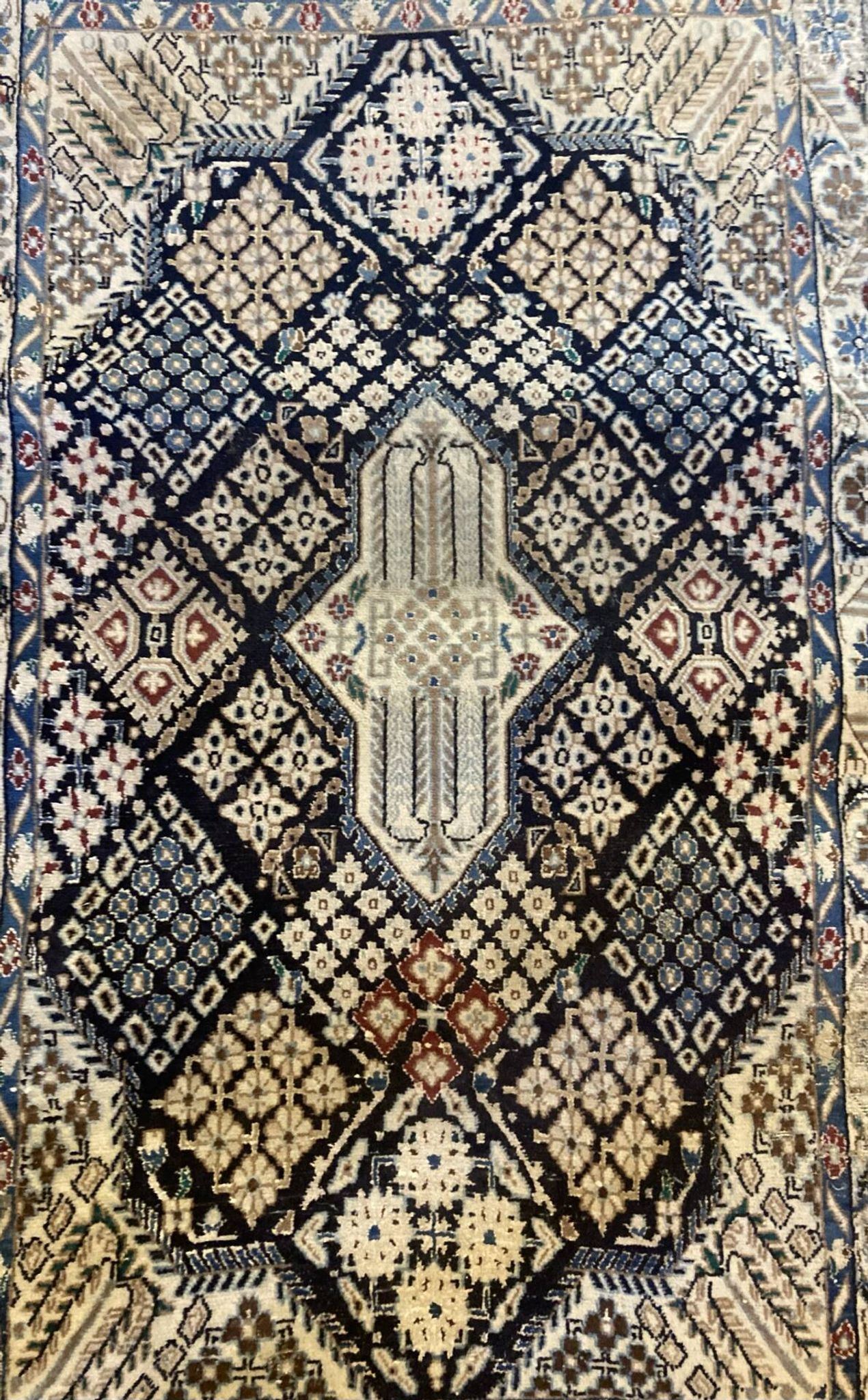 Carpet from the Irian region, 20th century, made of wool and silk.