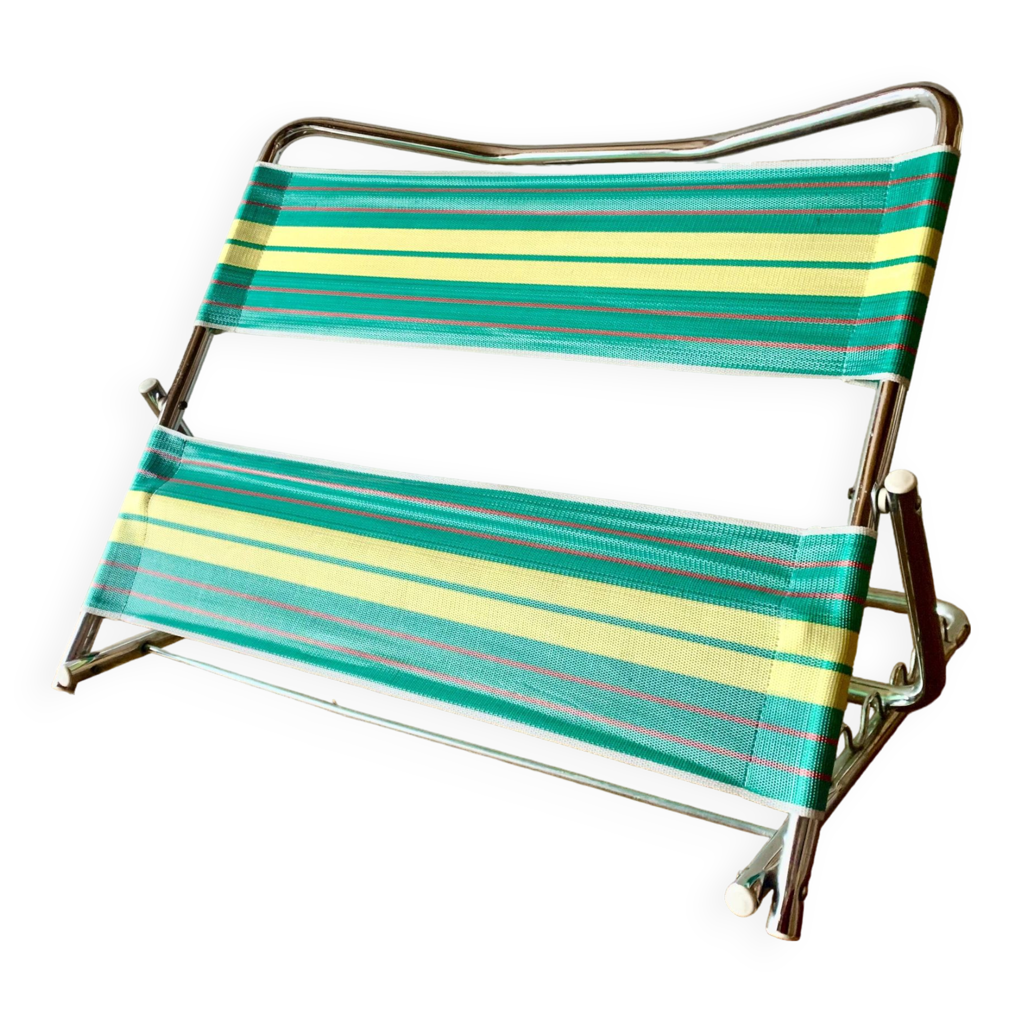Vintage folding beach chair in chrome metal and woven plastic