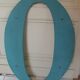 Wooden sign letter O