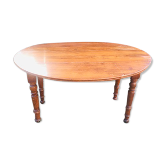 Table ronde extensible en bois de noyer 1930