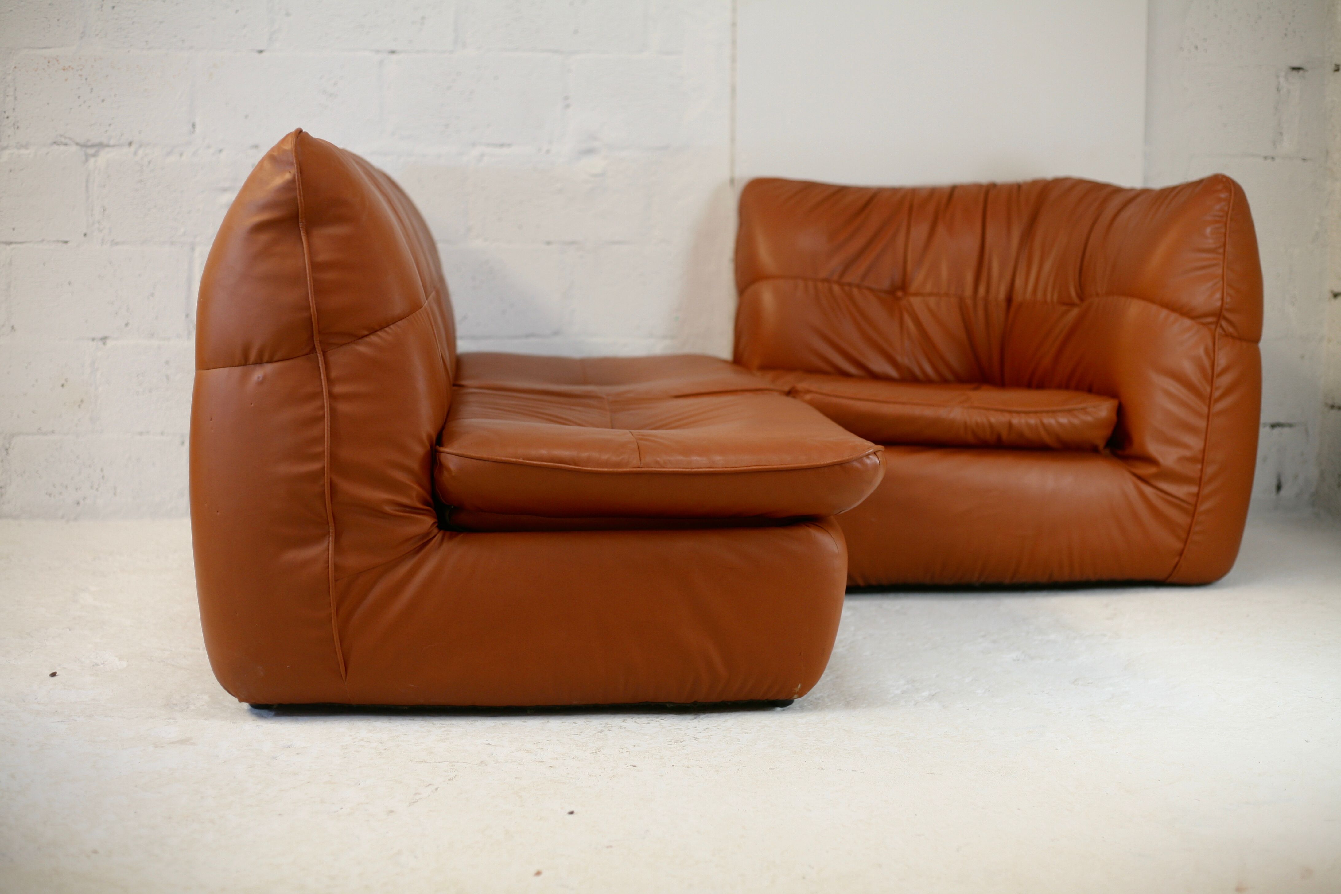 Imitation leather sofa "caramel". Convertible. France, circa 1990