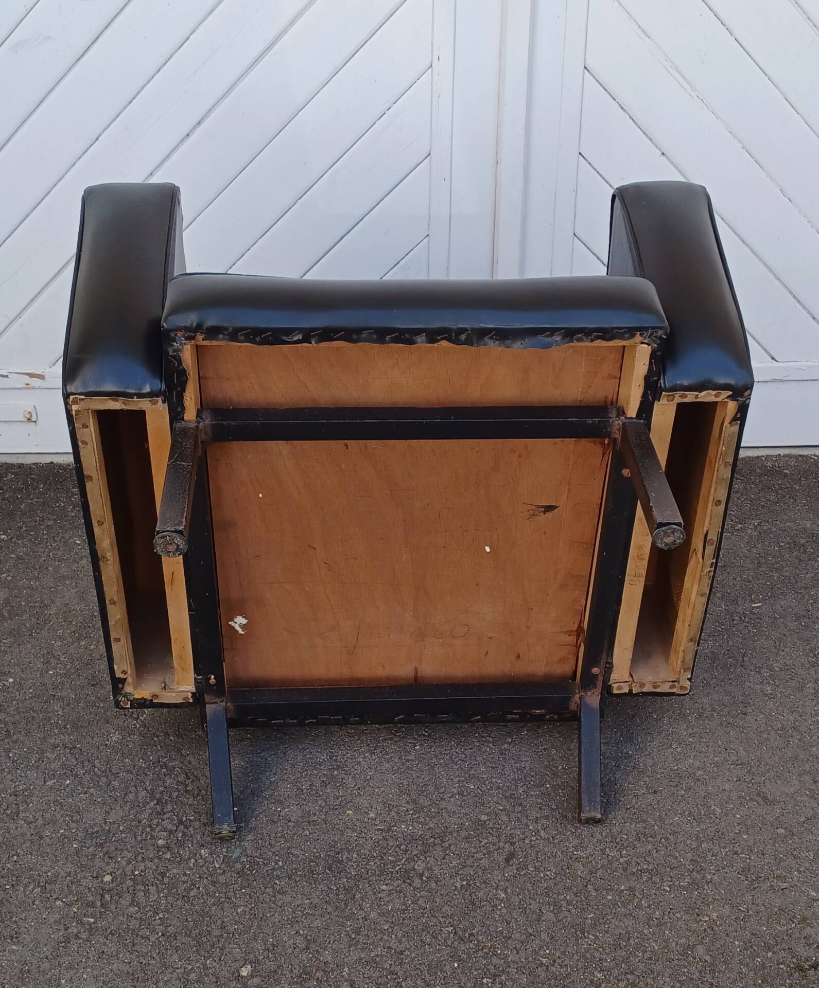 Black faux leather armchair from the 1960s