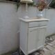 Small buffet, reimagined storage unit in beige.