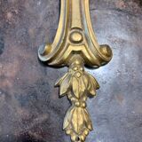 Pair of double sconces in gilded bronze