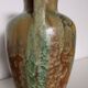 Iridescent crystal-glazed ceramic vase, with two handles, decorative piece.
