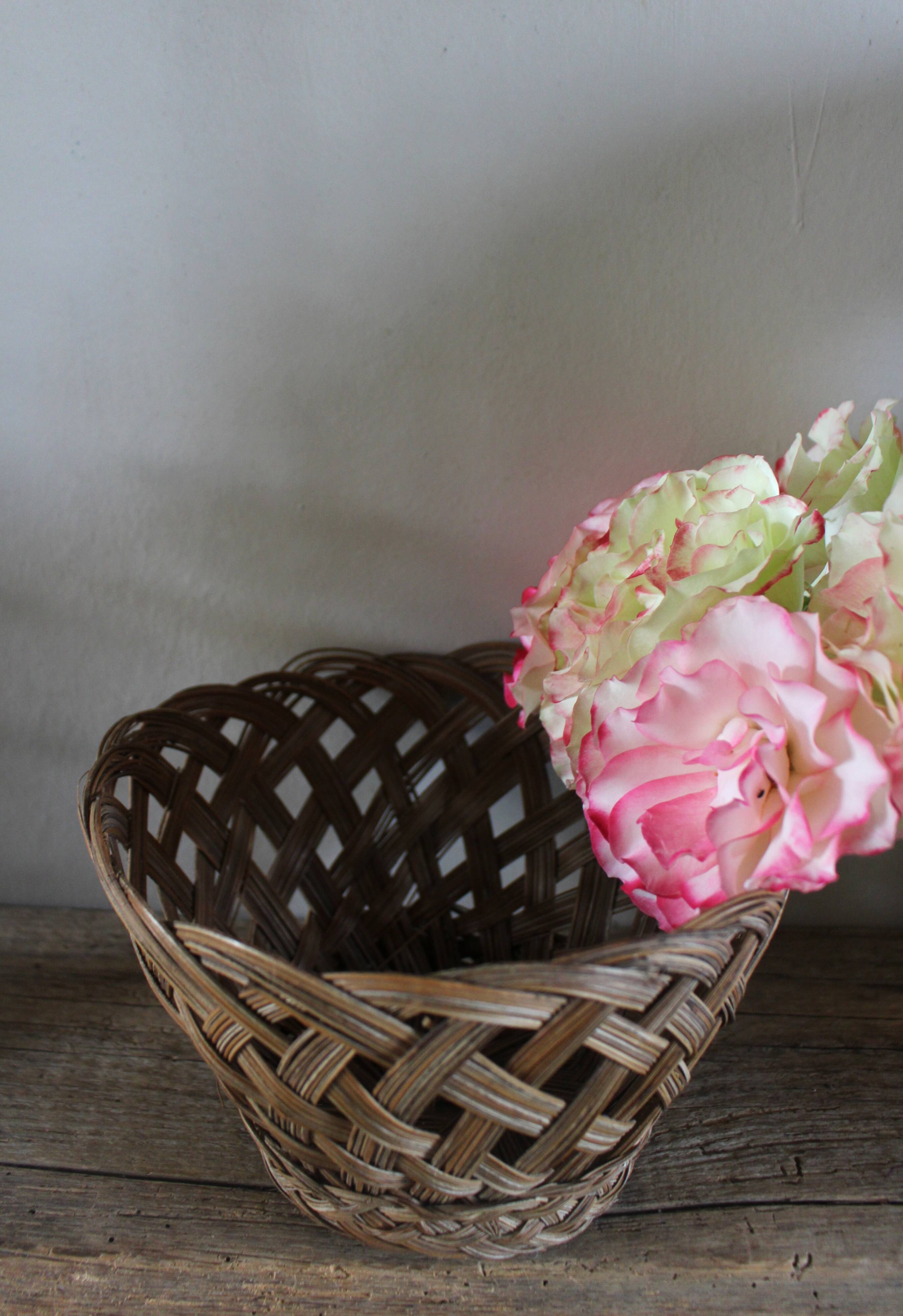Vintage high round wicker basket with openwork.