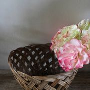 Vintage high round wicker basket with openwork.