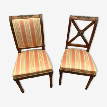 Deux chaises de style Empire en acajou XX siècle