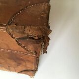 suitcase of leather with labels of palaces