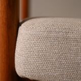 Upholstered armchair with teak frame