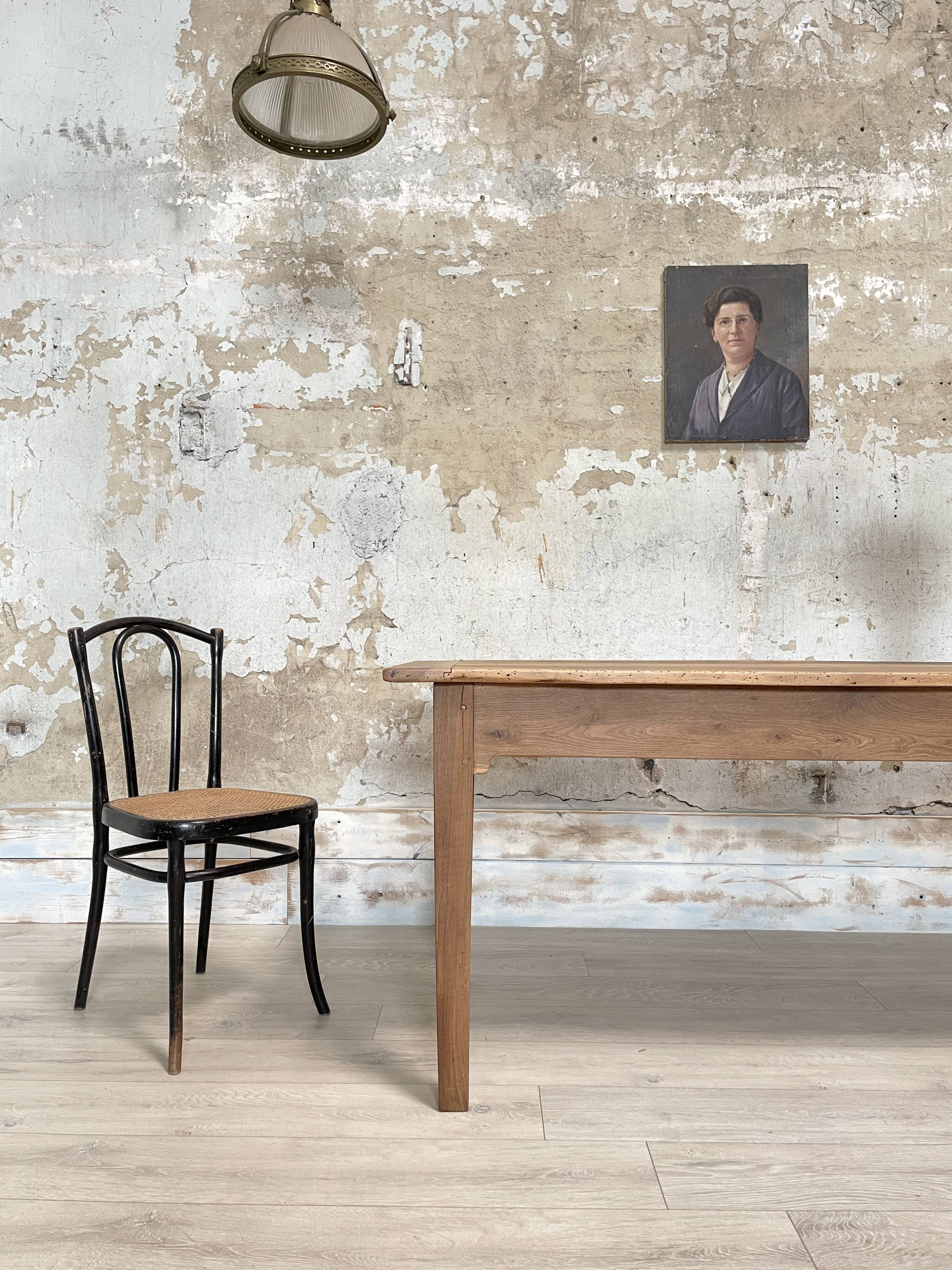 Vintage farmhouse table with spindle legs.