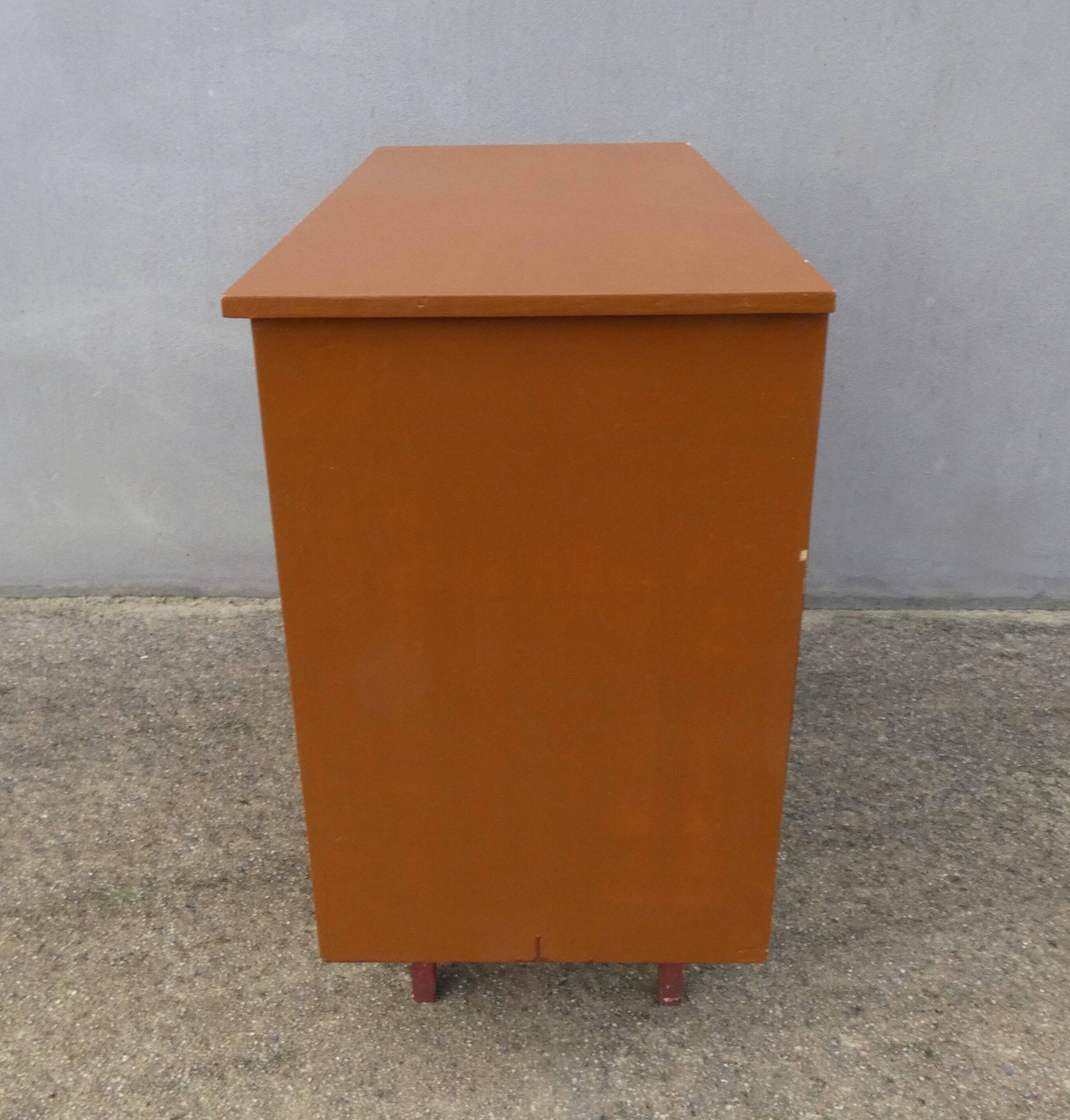 vintage wooden chest of drawers with tapered legs