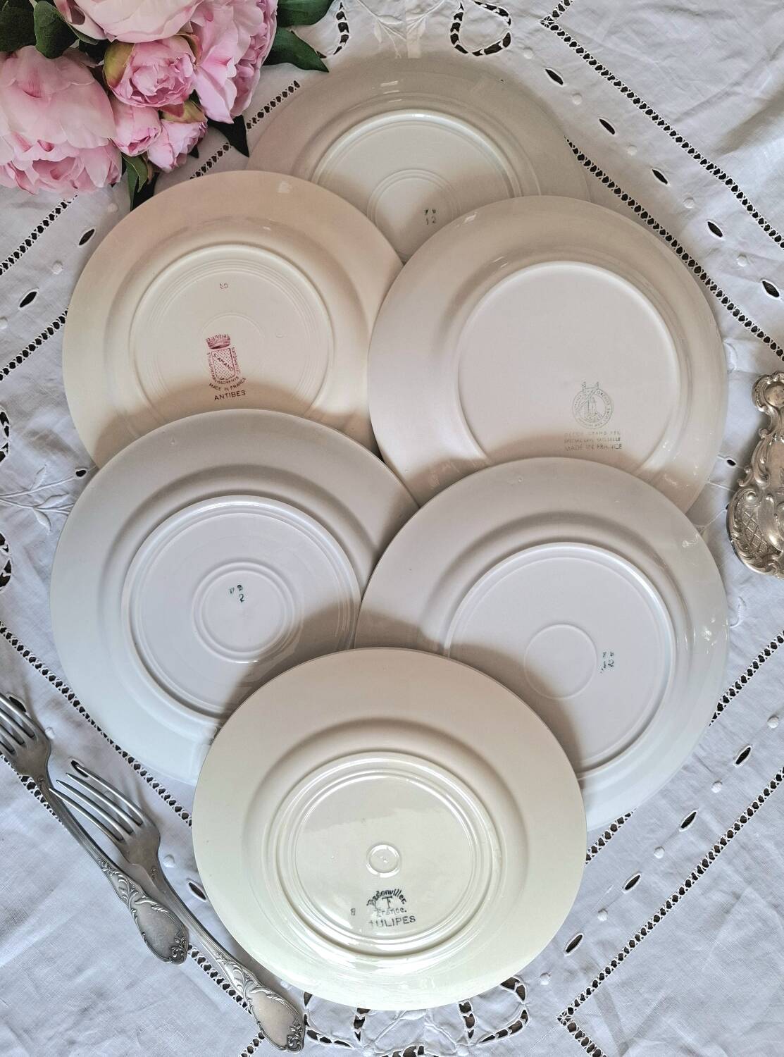 Mismatched antique flat plates in earthenware.