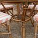 dining table and chairs made of curved bamboo and rattan with smoked glass from the 1970s