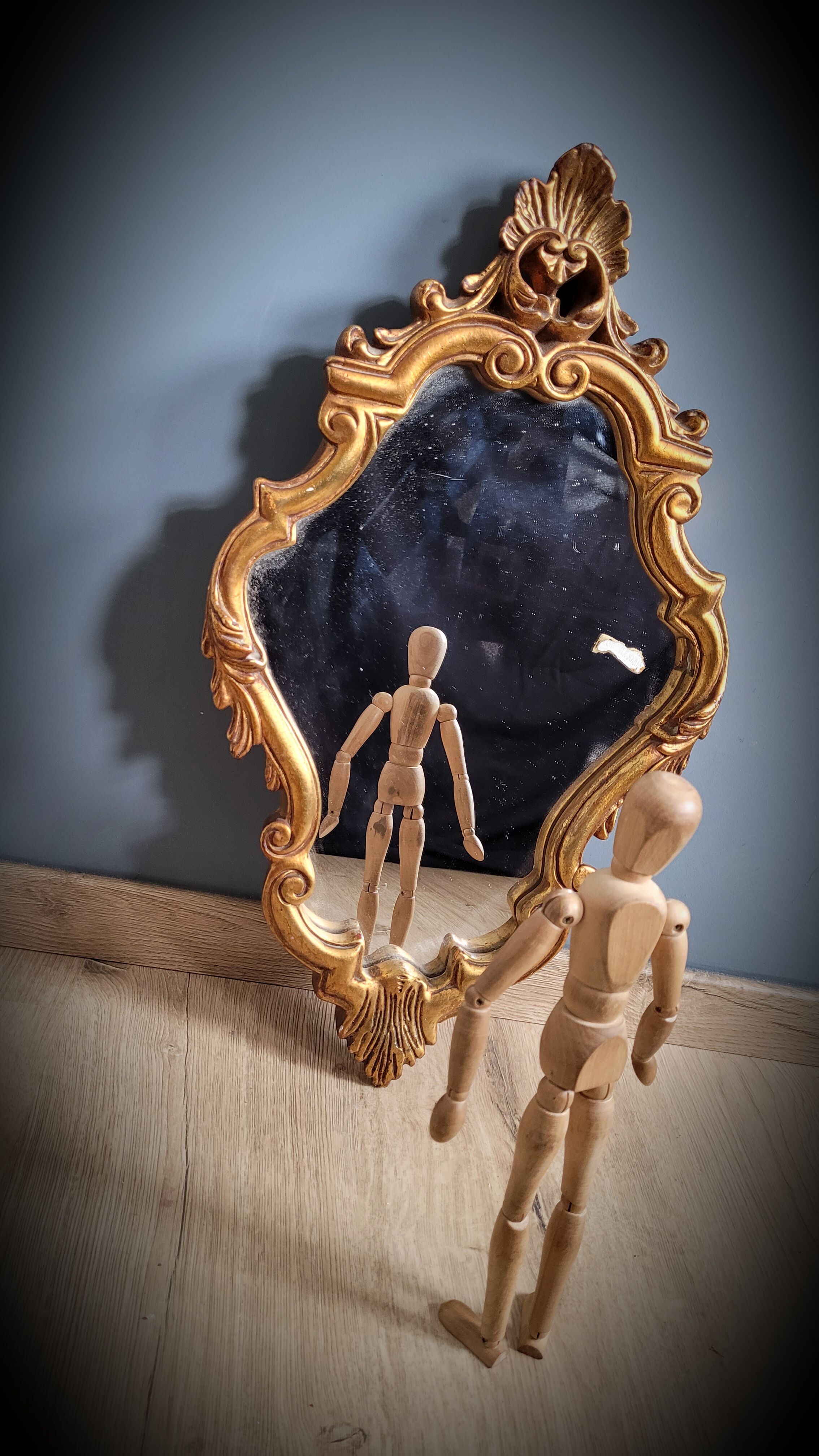 Gilded mirror worked 33x58cm