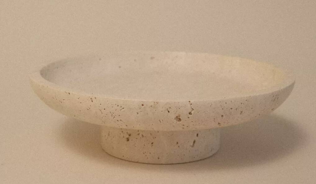 Travertine pocket emptier