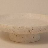 Travertine pocket emptier