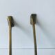 Pair of vintage brass hooks