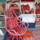 Restored vintage 70s armchair with custom-made Moroccan cushions, pink and red armchair