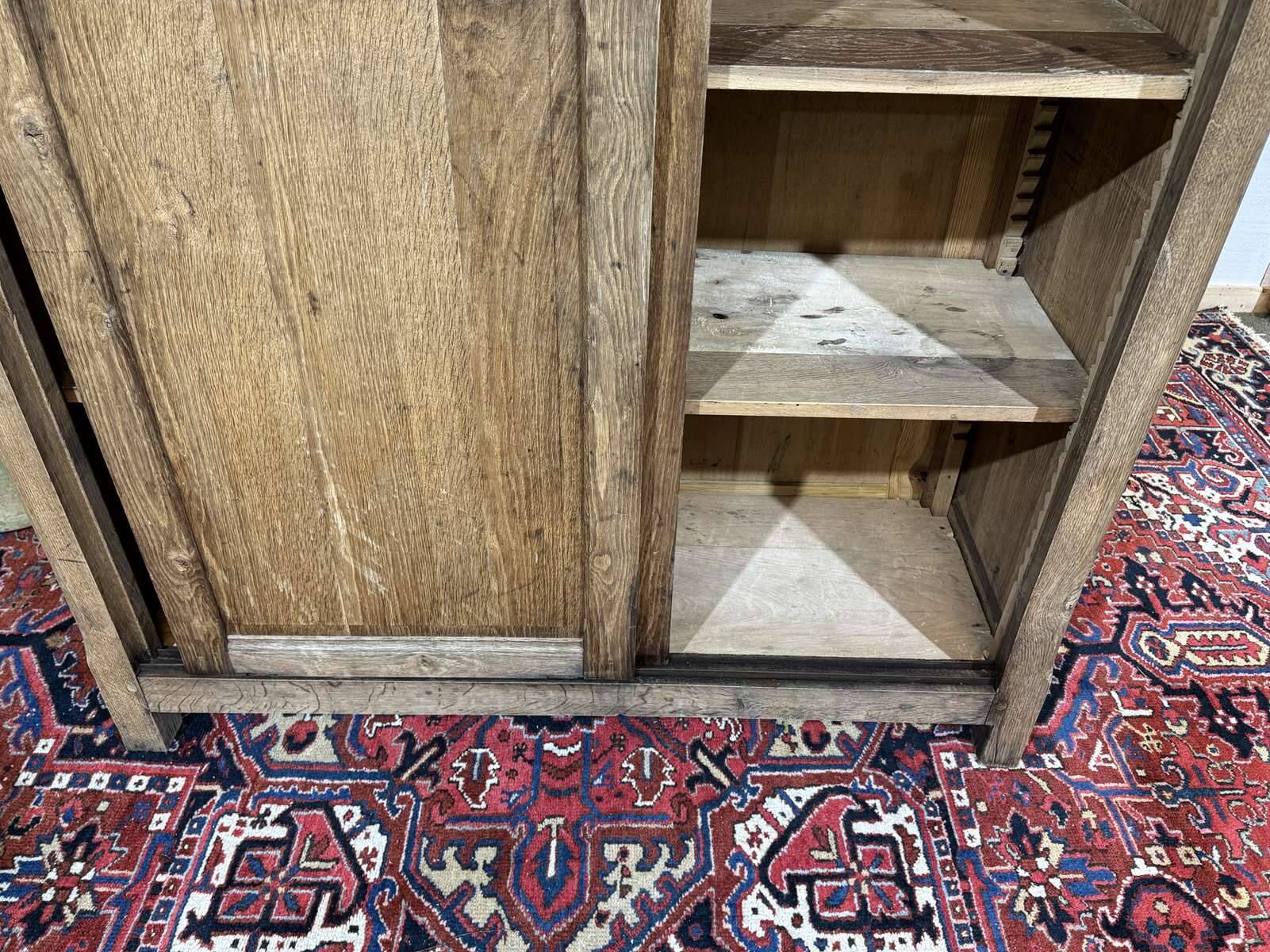 Oak wardrobe with sliding doors from the 1930s.