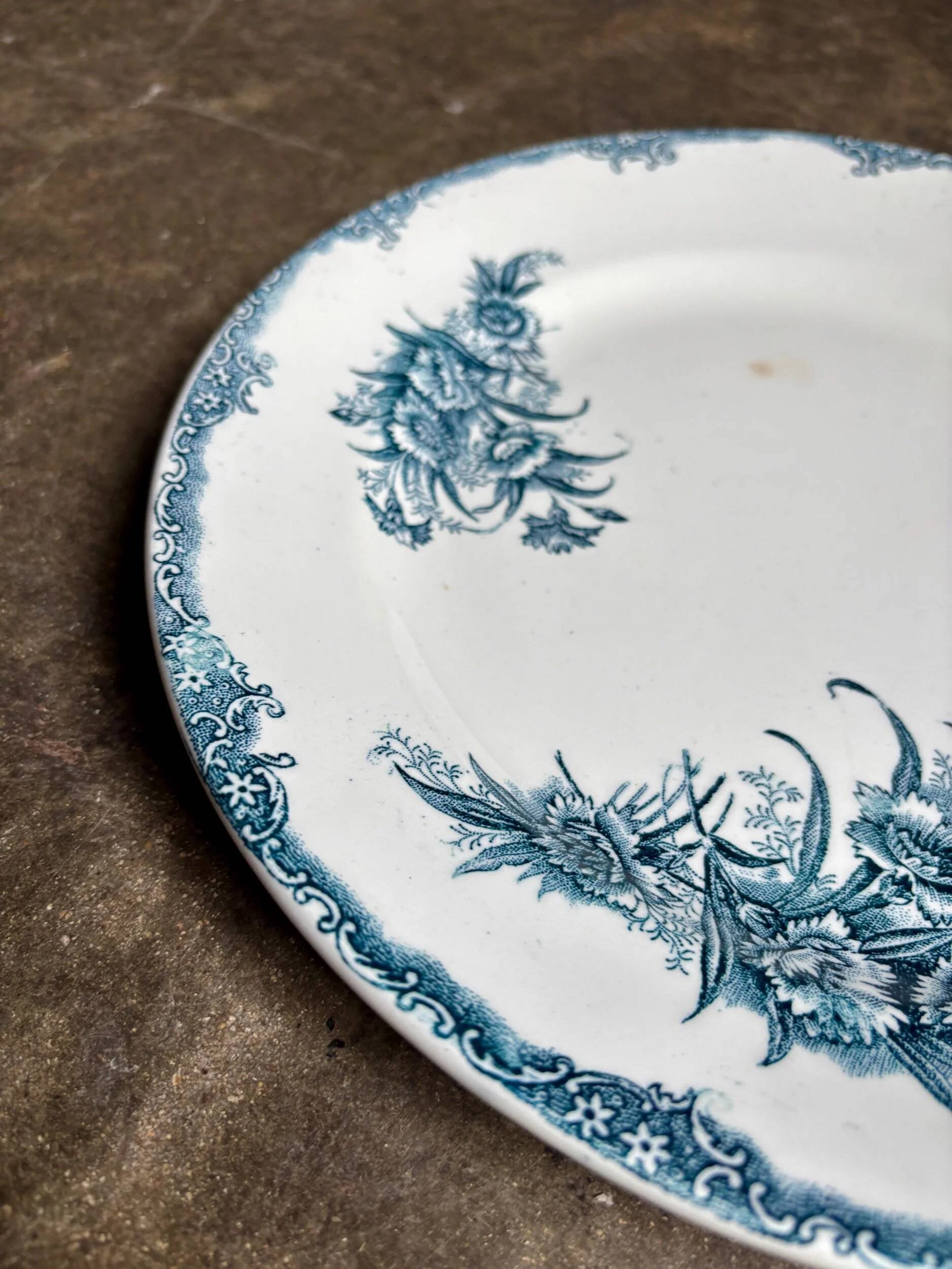 Léon Graves round dish in blue ironstone, "Oeillets" service