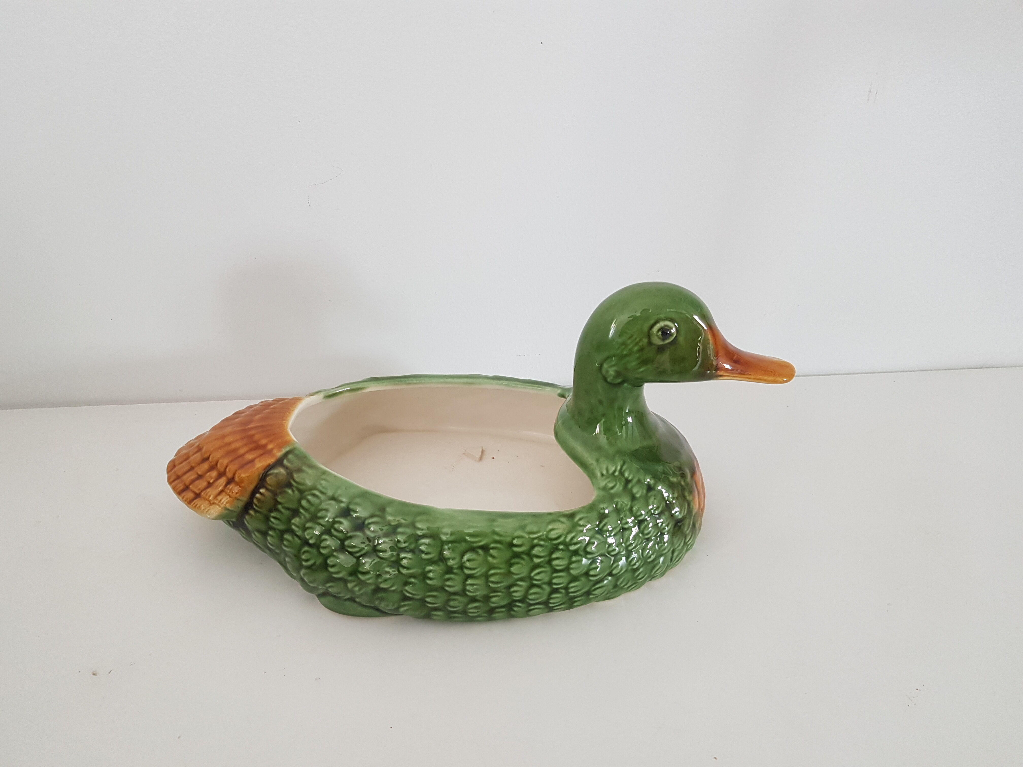 Empty pocket ceramic duck slip