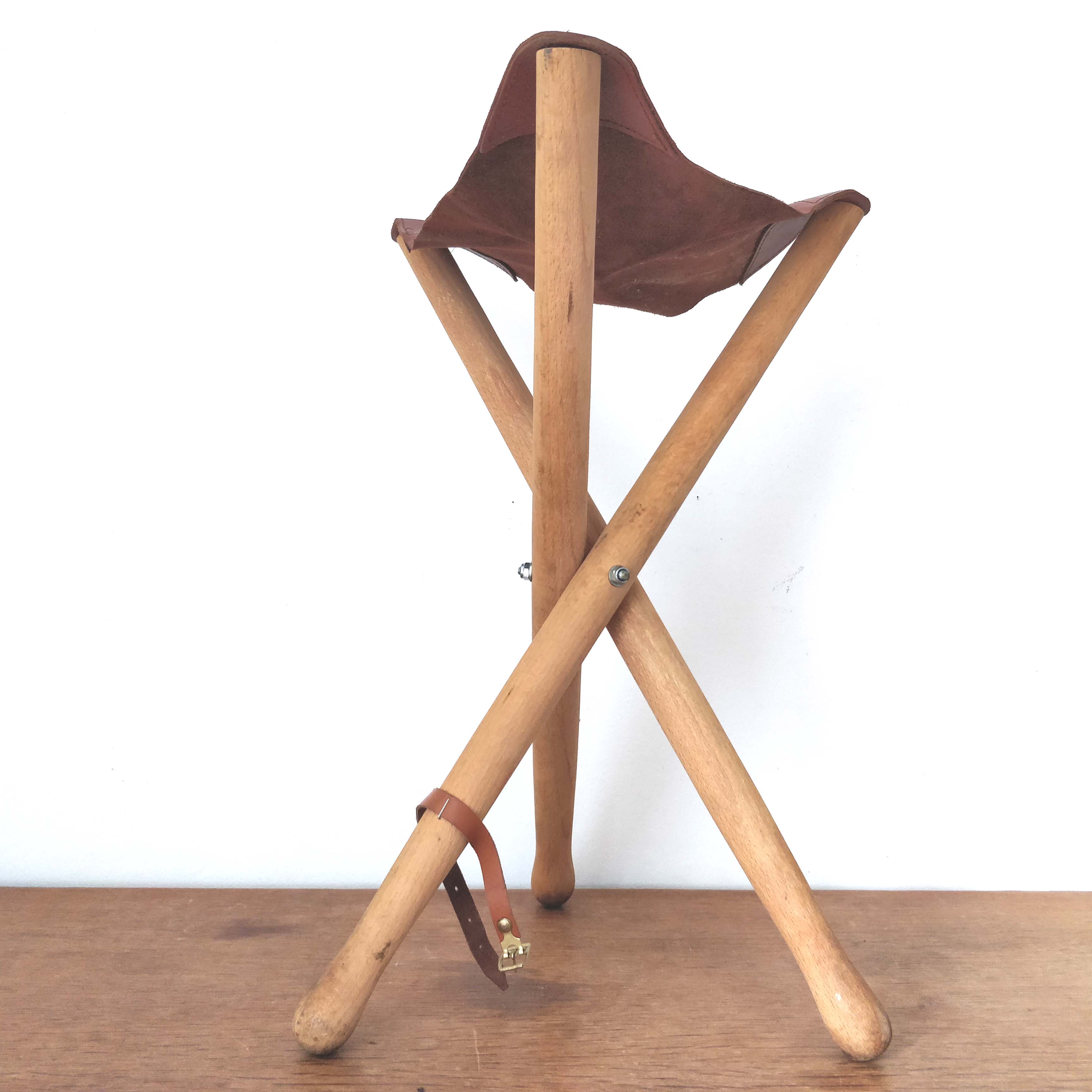 Folding wooden and leather stool