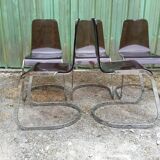 Chairs in plexiglas with chrome metal base