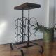Side table, brutalist bottle holder in wrought iron and solid wood.