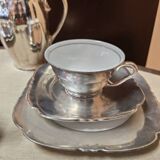 Breakfast set with tea or coffee in porcelain.