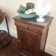 Wood and brass bedside