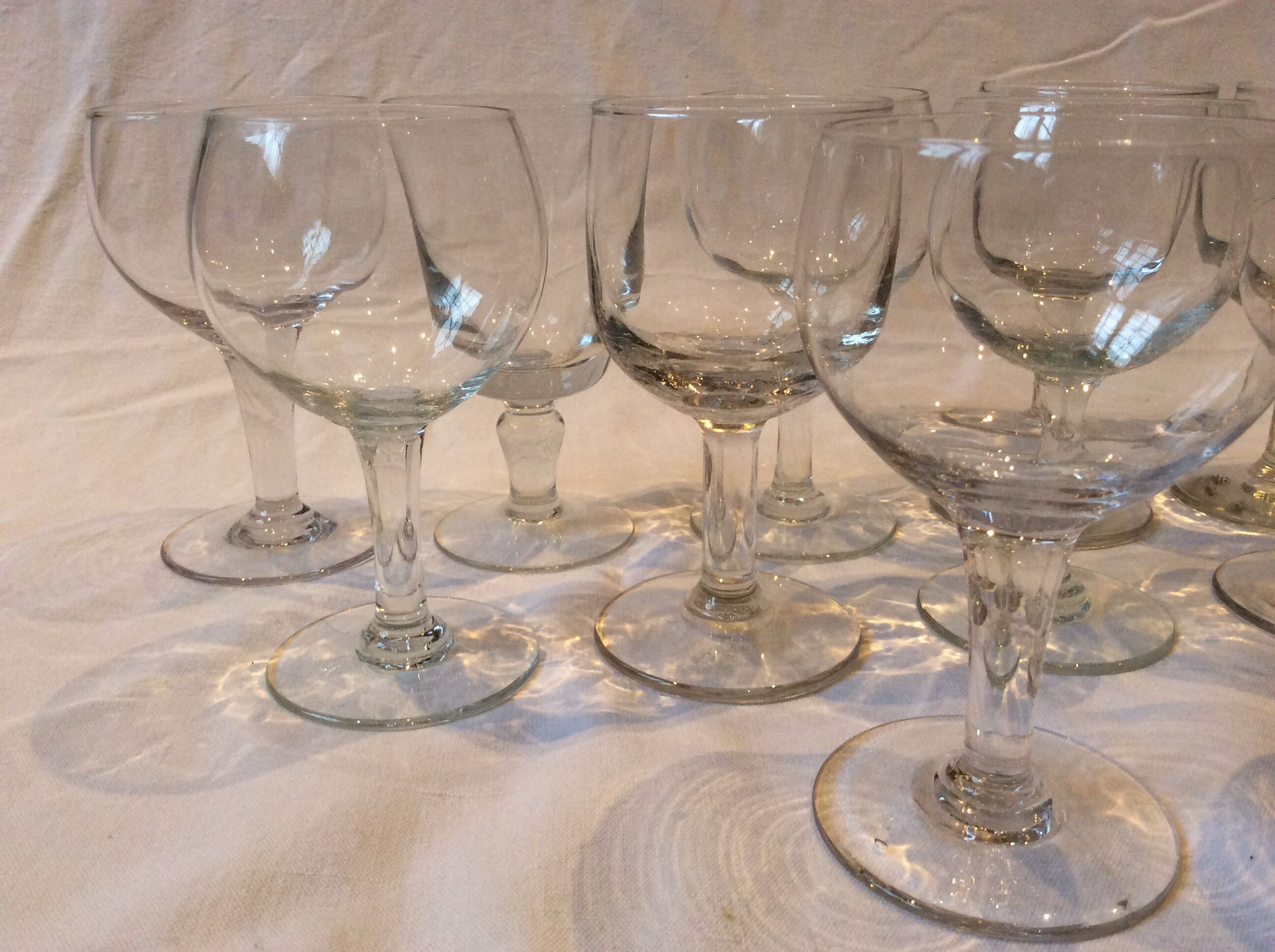 15 mismatched old glasses