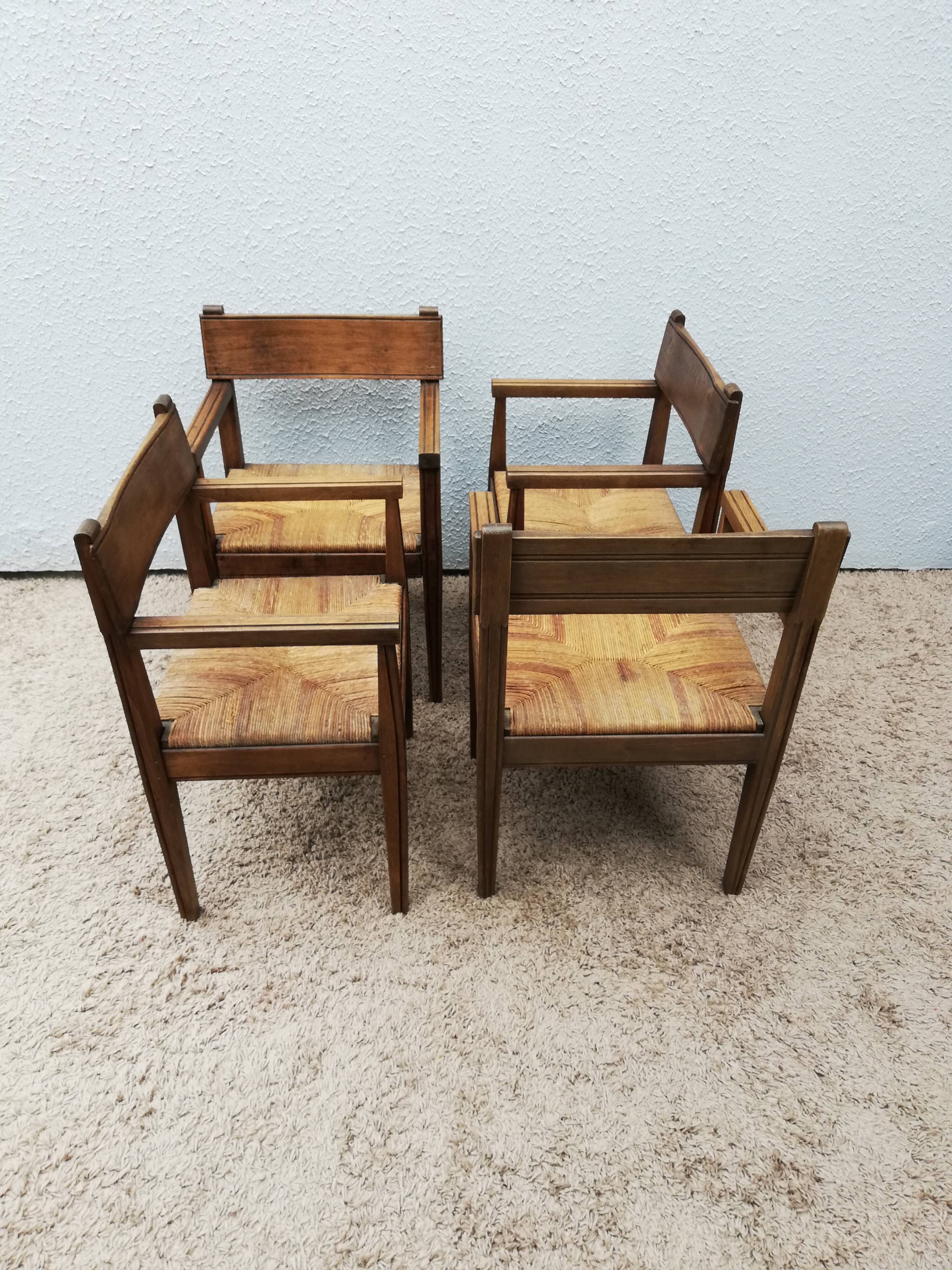 Suite of four mulched table chairs
