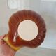 Brown and white ceramic shell bowl