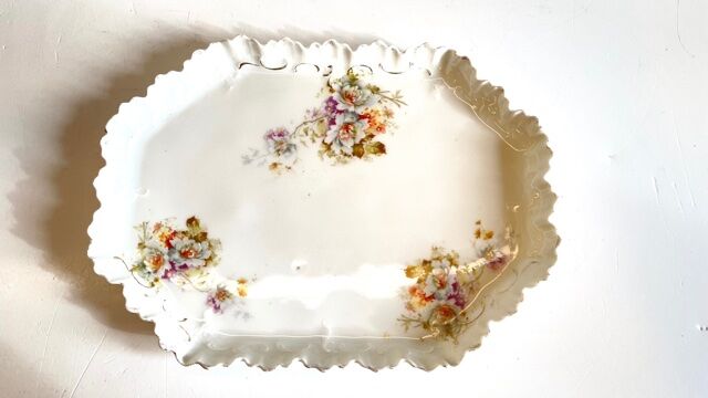Old tray in floral pattern biscuit