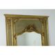 Miroir de trumeau en bois laqué vert et bois doré