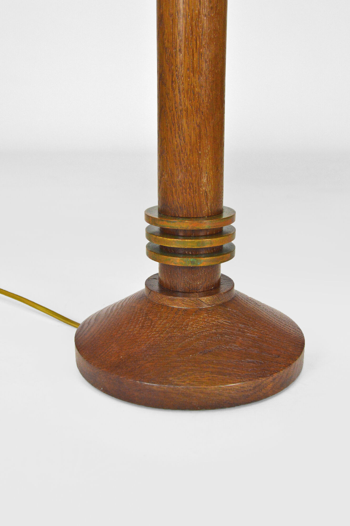 Pair of art deco lamps in wood and patinated bronze around 1930