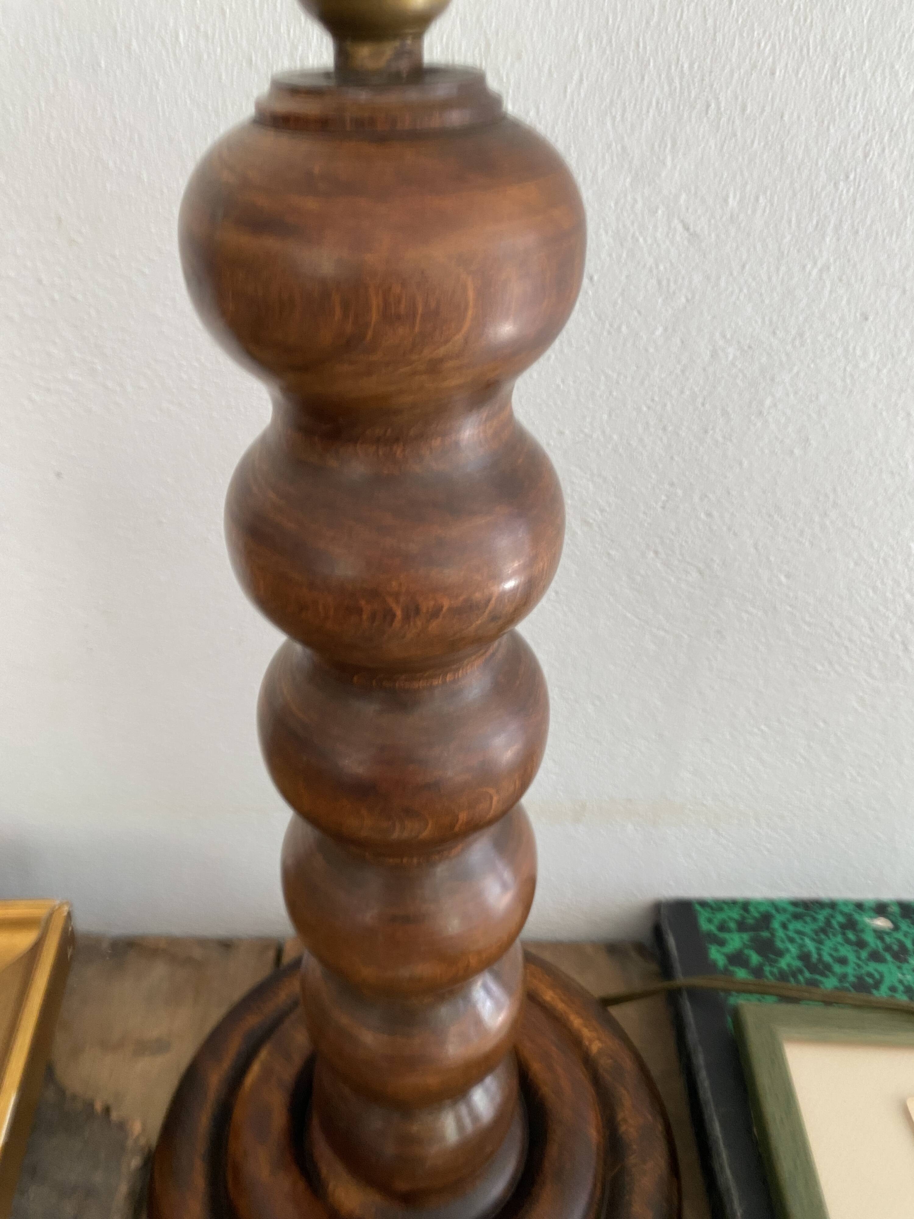 Turned wood lamp with paper shade