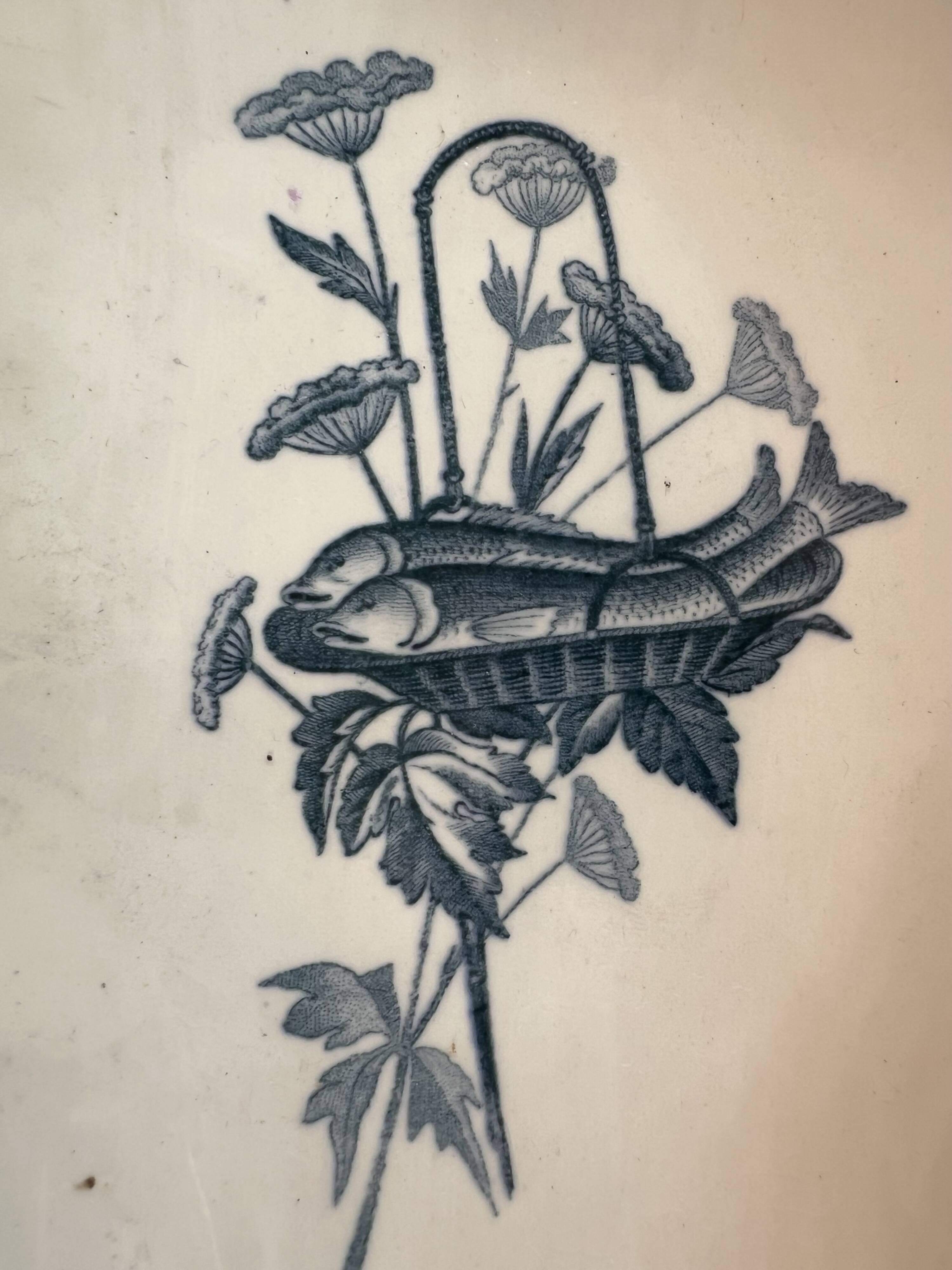 2 Badonviller earthenware dishes with fish decoration, screen model