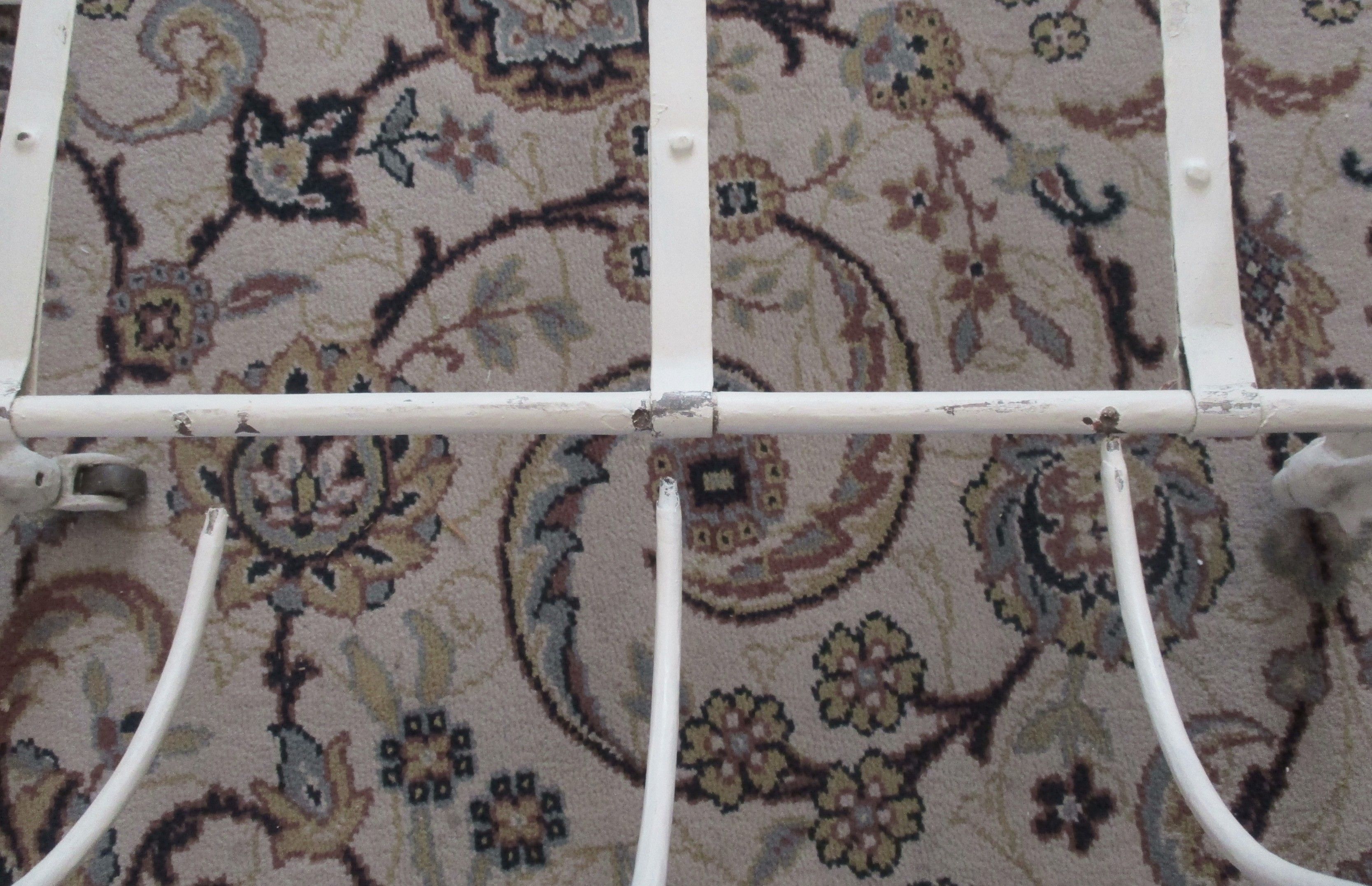 Cast iron and iron children's bed at the end of the 19th century