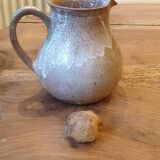 Handmade enameled stoneware pitcher