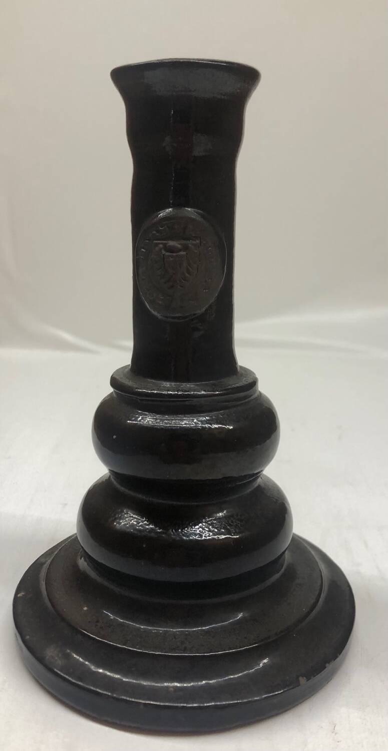 Black ceramic candlestick and escutcheon